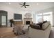 Living room with hardwood floors, fireplace, and stylish decor at 15786 Vitalize Run, Fishers, IN 46040