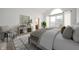 Relaxing main bedroom featuring a plush carpet and ensuite bathroom at 15786 Vitalize Run, Fishers, IN 46040