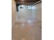Spacious basement featuring painted walls and speckled epoxy flooring at 2828 Robson St, Indianapolis, IN 46201
