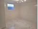 Clean basement featuring painted walls and speckled epoxy flooring at 2828 Robson St, Indianapolis, IN 46201