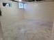 Spacious basement featuring painted walls and speckled epoxy flooring at 2828 Robson St, Indianapolis, IN 46201