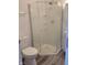 Bathroom featuring a corner shower with glass doors and modern fixtures at 2828 Robson St, Indianapolis, IN 46201
