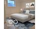 Digitally enhanced bedroom with finished walls and speckled flooring at 2828 Robson St, Indianapolis, IN 46201