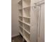 Storage closet with built in shelving providing an organized storage solution at 2828 Robson St, Indianapolis, IN 46201