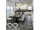 Spacious dining room with stylish chairs, modern lighting, and neutral tones at 2828 Robson St, Indianapolis, IN 46201