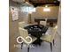 Finished basement with a game table, pool table, and neutral color palette for a cozy entertainment space at 2828 Robson St, Indianapolis, IN 46201