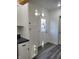 Bright kitchen with white cabinets, gray countertops, and stainless steel appliances, offering a clean and modern aesthetic at 2828 Robson St, Indianapolis, IN 46201