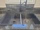 Close-up of a stainless steel kitchen sink with a black faucet and stylish gray backsplash at 2828 Robson St, Indianapolis, IN 46201