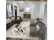 Inviting living room featuring neutral decor, stylish furniture, and a modern area rug on hardwood floors at 2828 Robson St, Indianapolis, IN 46201