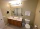 Bathroom features a dual sink vanity with ample counter space and a toilet at 5211 Nicodemus Dr, Plainfield, IN 46168
