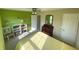 Bright bedroom with a double bed, built-in shelves, and an antique dresser at 5211 Nicodemus Dr, Plainfield, IN 46168