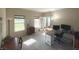 Home office with built-in desk, ample natural light, and french doors at 5211 Nicodemus Dr, Plainfield, IN 46168