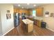 Modern kitchen with stainless steel appliances and an island at 5211 Nicodemus Dr, Plainfield, IN 46168