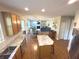 Open concept kitchen with island, stainless steel appliances and views to Gathering room at 5211 Nicodemus Dr, Plainfield, IN 46168