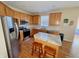 A kitchen featuring stainless steel appliances, a center island with seating, and plenty of cabinet space at 5211 Nicodemus Dr, Plainfield, IN 46168