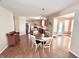 Open-concept space with a seamless transition from the modern kitchen to the dining area, ideal for Gathering gatherings at 5211 Nicodemus Dr, Plainfield, IN 46168