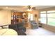 Spacious living room with hardwood floors, open floor plan, and kitchen view at 5211 Nicodemus Dr, Plainfield, IN 46168