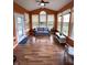 Bright sunroom featuring many windows and ample natural light, perfect for relaxing or enjoying the view at 5211 Nicodemus Dr, Plainfield, IN 46168