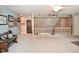 Bonus room with plush carpeting and neutral paint provides ample living space at 1612 S Jeanne Ct, New Palestine, IN 46163