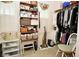 Walk-in closet with shelves and hanging racks at 1612 S Jeanne Ct, New Palestine, IN 46163