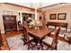 Elegant dining room featuring an wooden table and decor at 1612 S Jeanne Ct, New Palestine, IN 46163