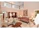 Bright living room featuring columns, tall ceilings and natural light at 1612 S Jeanne Ct, New Palestine, IN 46163