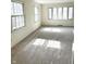 Bedroom showcasing neutral carpet, many windows and natural light at 7722 Shady Hills W Dr, Indianapolis, IN 46278