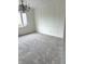 Dining room showcasing neutral carpet and custom paneled walls at 7722 Shady Hills W Dr, Indianapolis, IN 46278