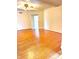 Living room showcasing hardwood floors at 7722 Shady Hills W Dr, Indianapolis, IN 46278