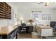 Well-lit office space with a mix of desk styles and a bright window for natural light at 610 E Morgan St, Martinsville, IN 46151