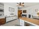 Bright office featuring carpet floors, white walls, a ceiling fan, and lots of desk space at 610 E Morgan St, Martinsville, IN 46151