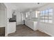 Modern kitchen with white cabinets and quartz countertops at 2103 Danbury Dr, Indianapolis, IN 46231