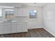 Modern kitchen featuring white cabinets and hardwood floors at 2103 Danbury Dr, Indianapolis, IN 46231