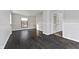 Bright bedroom with dark hardwood floors and window at 2103 Danbury Dr, Indianapolis, IN 46231