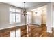 Open dining room with hardwood floors and chandelier at 3530 Inverness Blvd, Carmel, IN 46032