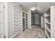 Walk-in closet with adjustable shelving and lots of room for storage at 6502 Allisonville Rd, Indianapolis, IN 46220
