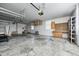 Spacious three car garage featuring ample room for parking, storage and lots of natural light at 6502 Allisonville Rd, Indianapolis, IN 46220