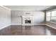 Bright living room with a fireplace and lots of natural light at 6502 Allisonville Rd, Indianapolis, IN 46220