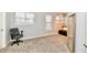 Bedroom with carpet, two windows with blinds, a brown daybed and a full size mirror at 7854 Harbour Isle, Indianapolis, IN 46240