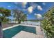 Pool with large patio overlooking a scenic community lake at 7854 Harbour Isle, Indianapolis, IN 46240
