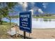 Enjoy private lake access with sandy beach, clear water, and community atmosphere at 7854 Harbour Isle, Indianapolis, IN 46240