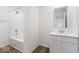 Clean bathroom with a bathtub, shower, vanity, and mirror at 9275 Loyola Way, Plainfield, IN 46168