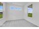 Bright bedroom with grey carpet and large windows offering ample natural light at 9275 Loyola Way, Plainfield, IN 46168