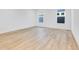 Spacious bedroom with light wood flooring and large windows at 9275 Loyola Way, Plainfield, IN 46168