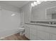 Bright bathroom with double vanity, shower-tub combination, and tile flooring at 10133 Redwood Peak Ln, Indianapolis, IN 46259