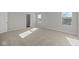 Light-filled bedroom with neutral carpet and light walls at 10133 Redwood Peak Ln, Indianapolis, IN 46259