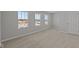 Light-filled bedroom with three windows, flooding the space with natural light at 10133 Redwood Peak Ln, Indianapolis, IN 46259