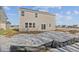 Exterior view showing slider to patio and light gray siding at 10133 Redwood Peak Ln, Indianapolis, IN 46259