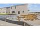 View of backyard with light gray vinyl siding and a patio area at 10133 Redwood Peak Ln, Indianapolis, IN 46259