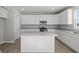 Well-designed kitchen with an island, modern appliances, and plenty of cabinet space at 10133 Redwood Peak Ln, Indianapolis, IN 46259